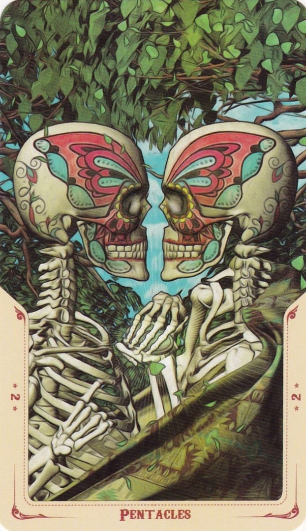 Two of Pentacles — Santa Muerte Tarot Card Meanings